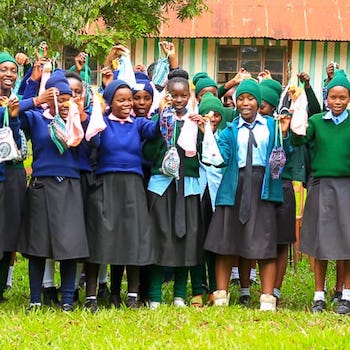 SAG Kit Distribution image showing Kianguenyi Secondary School girls receiving 145 kits in Kerugoya, Kenya on Feb 24, 2026