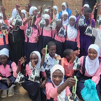 SAG Kit Distribution image showing Luteete Primary School girls receiving 125 kits in Luteete, Uganda on Mar 17, 2026