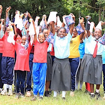 SAG Kit Distribution image showing Gutunguru Primary girls receiving 215 kits in Ithare, Kenya on Mar 26, 2026