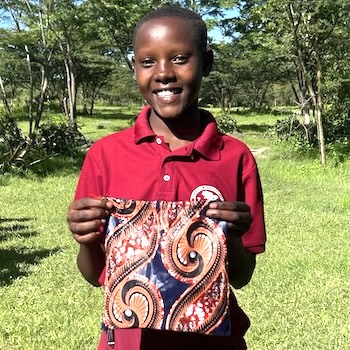 SAG Kit Distribution image showing Soitsambu Secondary School girls receiving 100 kits in Ngorongoru, Tanzania on Mar 27, 2026