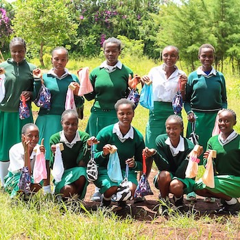 SAG Kit Distribution image showing Kathaka Secondary School girls receiving 129 kits in Kagio, Kenya on Apr 30, 2026