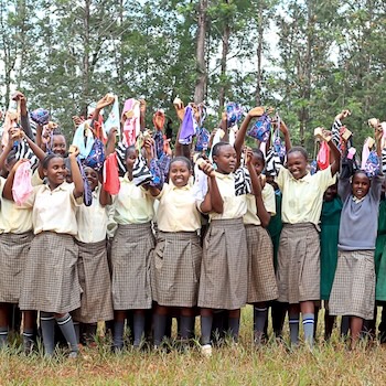 SAG Kit Distribution image showing Irembu Primary School girls receiving 163 kits in Irembu, Kenya on May 8, 2026
