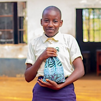 SAG Kit Distribution image showing St. Philip's Vote Comprehensive School girls receiving 46 kits in Kitui, Kenya on May 14, 2026
