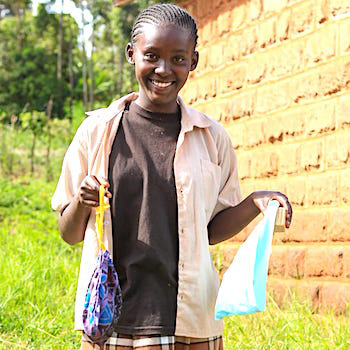 SAG Kit Distribution image showing Ichuga Primary School girls receiving 163 kits in Kiawarigi, Kenya on June 2, 2026
