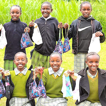 SAG Kit Distribution image showing Unjiru Primary School girls receiving 152 kits in Karatina, Kenya on June 2, 2026
