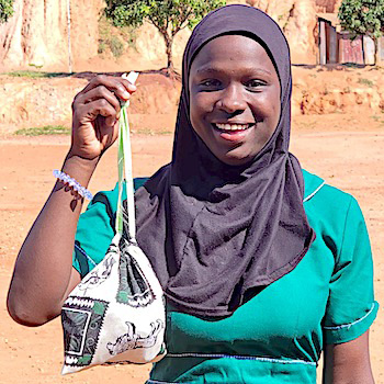 SAG Kit Distribution image showing One Heart Junior School girls receiving 211 kits in Kampala, Uganda on June 5, 2026