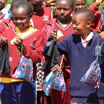 SAG Kit Distribution image showing Kianjogu Primary School girls receiving 111 kits in Kianjogu, Kenya on June 11, 2026