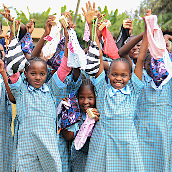 SAG Kit Distribution image showing Kiangoma Primary School girls receiving 123 kits in Karatina, Kenya on July 3, 2026
