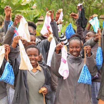 SAG Kit Distribution image showing Kianjogu Secondary School girls receiving 188 kits in Wariruta, Kenya on July 17, 2026