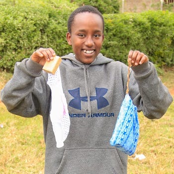 SAG Kit Distribution image showing Kianjogu Secondary School girls receiving 188 kits in Wariruta, Kenya on July 17, 2026