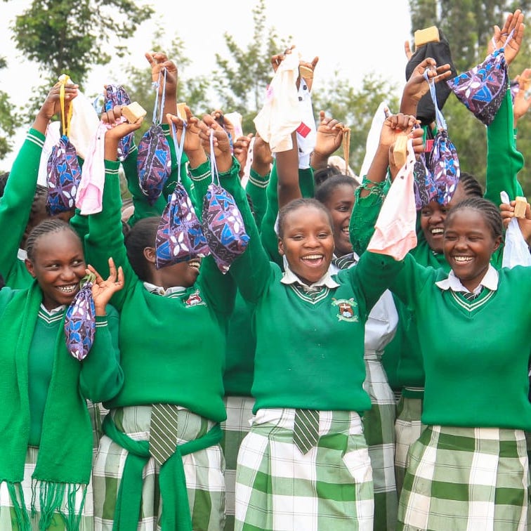 SAG Kit Distribution image showing Ngunguru Secondary School girls receiving 188 kits in Karogoto, Kenya on July 17, 2026