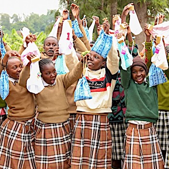 SAG Kit Distribution image showing Kabare Primary School girls receiving 122 kits in Kabare, Kenya on July 24, 2026
