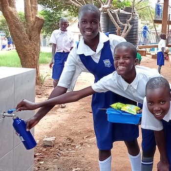 Kabowa students drinking water
